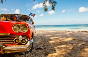 American classic car on the beach Cayo Jutias, Province Pinar del Rio, Cuba Cayo Jutias, Cuba - December 14, 2016: American classic car on the beach Cayo Jutias, Province Pinar del Rio, Cuba